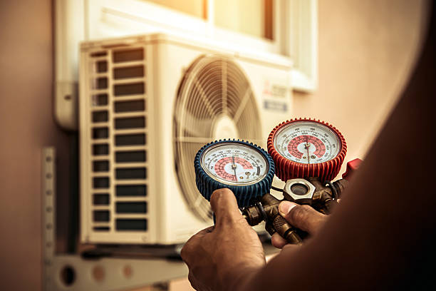 Professional Air Conditioning Service technician working in Oakland Gardens, NY
